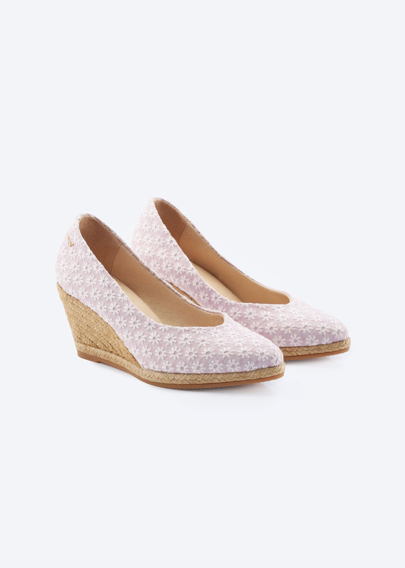 Pale pink floral wedge espadrille pumps with a pointed toe and natural braided jute wedge, handcrafted in Spain