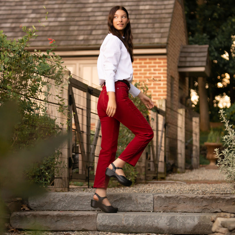 Black clog sandals provide endless support for fall style.