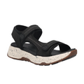 The TAOS Taos Womens Super Side Black sandal features adjustable straps, a black open-toe design, a white speckled thick sole, and a brown textured all-terrain rubber outsole.