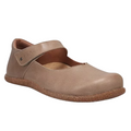 A single TAOS Taos Women's Ultimate Leather Mary Jane Mushroom shoe, featuring a Velcro strap, brown textured rubber sole, and arch support, is photographed on a white background.