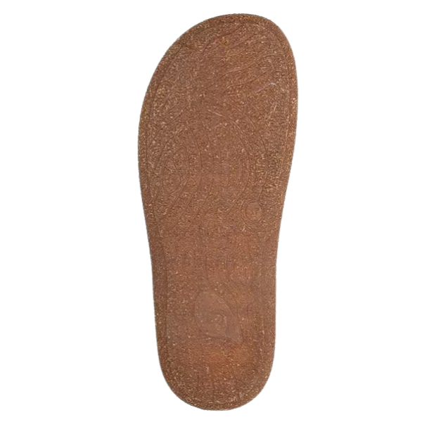 The TAOS Women's Ultimate Leather Mary Jane Mushroom features a brown, textured insole with arch support and a subtle pattern, providing orthotic-friendly comfort for all-day wear.
