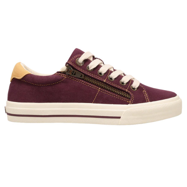 The Taos Women's Z Soul Daisy Plum by TAOS is a maroon canvas sneaker with a white sole, tan heel accent, white laces, and a brown side zipper—providing comfy plantar fasciitis support. Shown in profile view facing right.