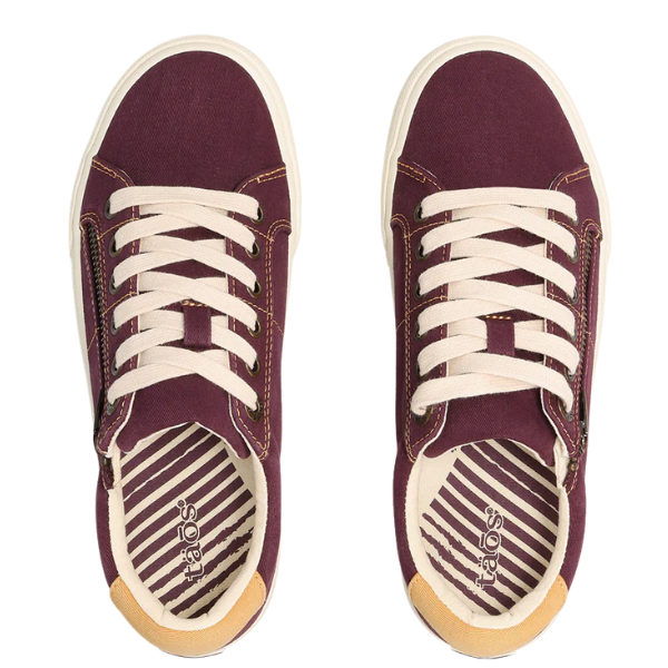 A pair of Taos Women's Z Soul Daisy Plum sneakers by TAOS, shown from above with beige laces and soles, striped insoles with taos branding, and supportive comfort for women with plantar fasciitis.