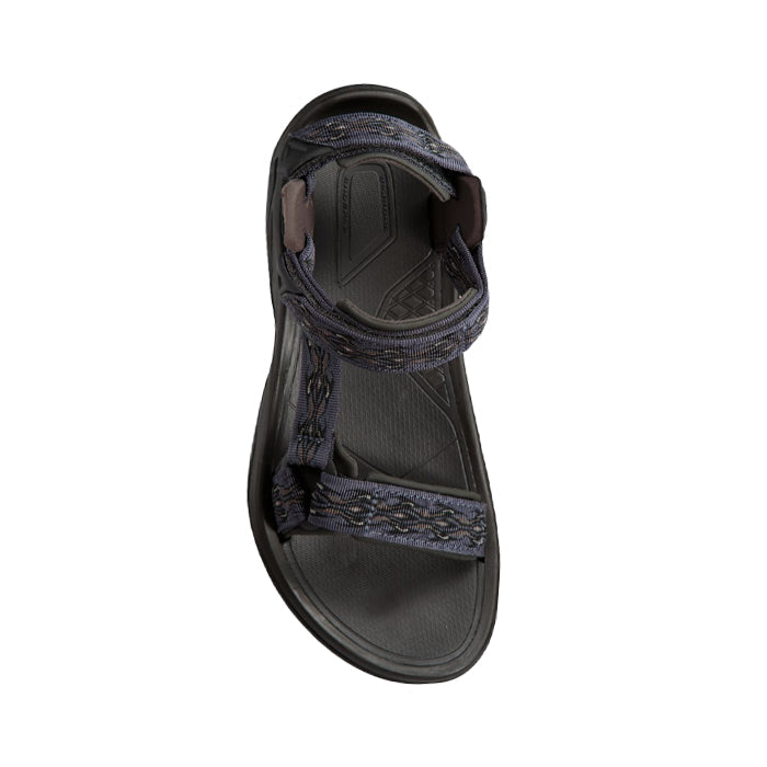 A single Teva Mens Terra FI 5 Universal Madang Blue sandal with adjustable straps and a textured sole, seen from above on a white background.