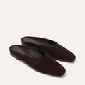 The Clara - Espresso Suede by Margaux: minimalist dark brown suede slip-on loafers with slightly squared toes and a slipper-like silhouette, shown on a neutral background.