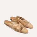 Pair of woven sandals on a white background