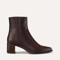 The Downtown Boot in Espresso Calf, a chic ankle-height design complete with a Western-inspired welt and a comfortable 2.5-inch stacked heel.