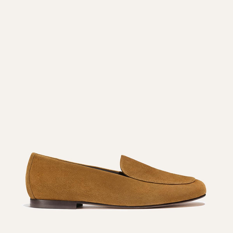 The James Loafer - Cedar Suede by Margaux is shown on a plain light background, positioned to highlight the outer side and its low dark brown heel.