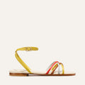 The Paros Sandal by Margaux features yellow ankle buckle, sole edge, and three slim front straps in yellow, orange, and light blue multicolor nappa—blending playful hues with Julia Berolzheimer's signature minimalist style.