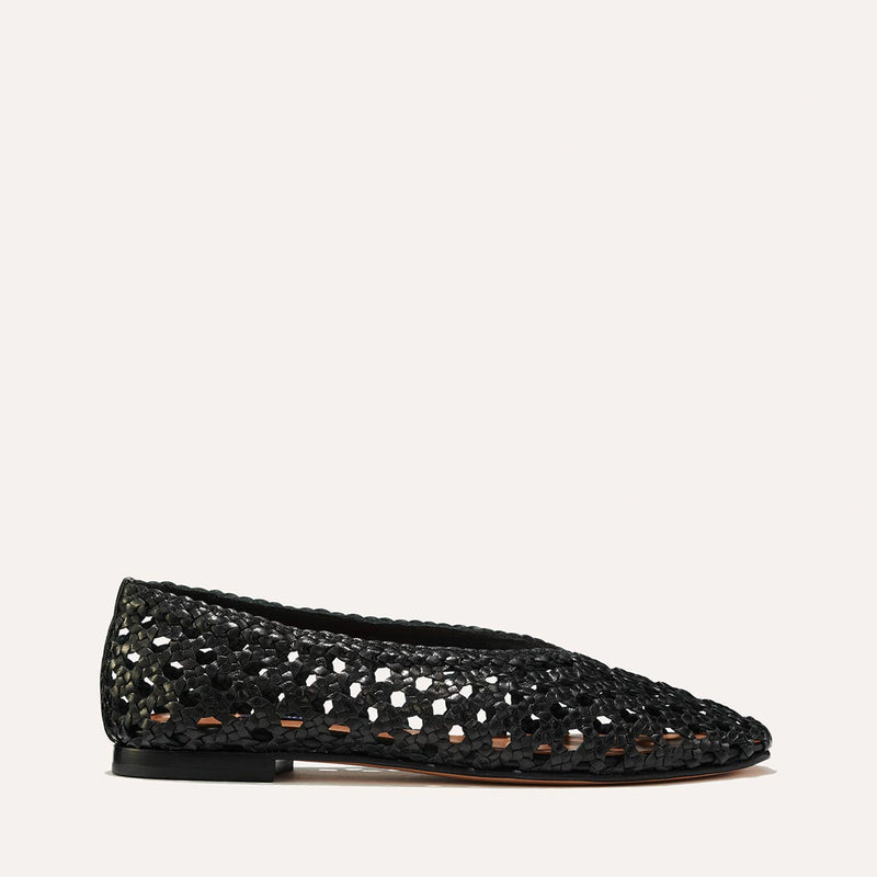 The Woven Paz in Black, featuring a handwoven Italian nappa leather upper with a flattering tapered toe and high vamp.