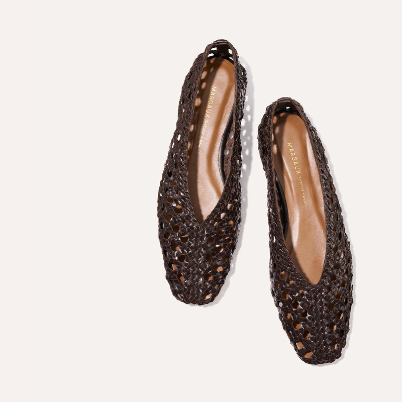 The Woven Paz SS25 - Espresso Leather by Margaux: pointed-toe, handwoven ballet flats in rich brown leather, shown from above on a plain, light background.