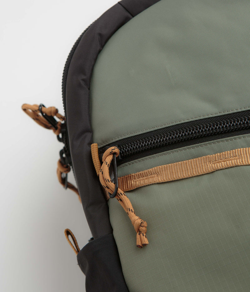 Topo Designs Commuter Backpack in Beetle and Khaki