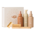 The UGG Care Kit by UGG comes in a white sunburst box and includes Protector, Cleaner & Conditioner, Shoe Renew sprays, two wooden brushes, and a cleaning block—perfect for sheepskin boot care.