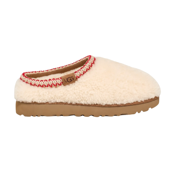The UGG Women's Tasman Maxi Natural slipper features a cream color, fuzzy UGGplush texture, tan sole, and red-and-white stitching around the opening.