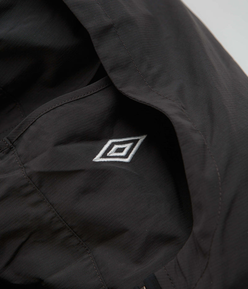 Umbro Rose Crest Masked Track Jacket in Black and Dark Gray