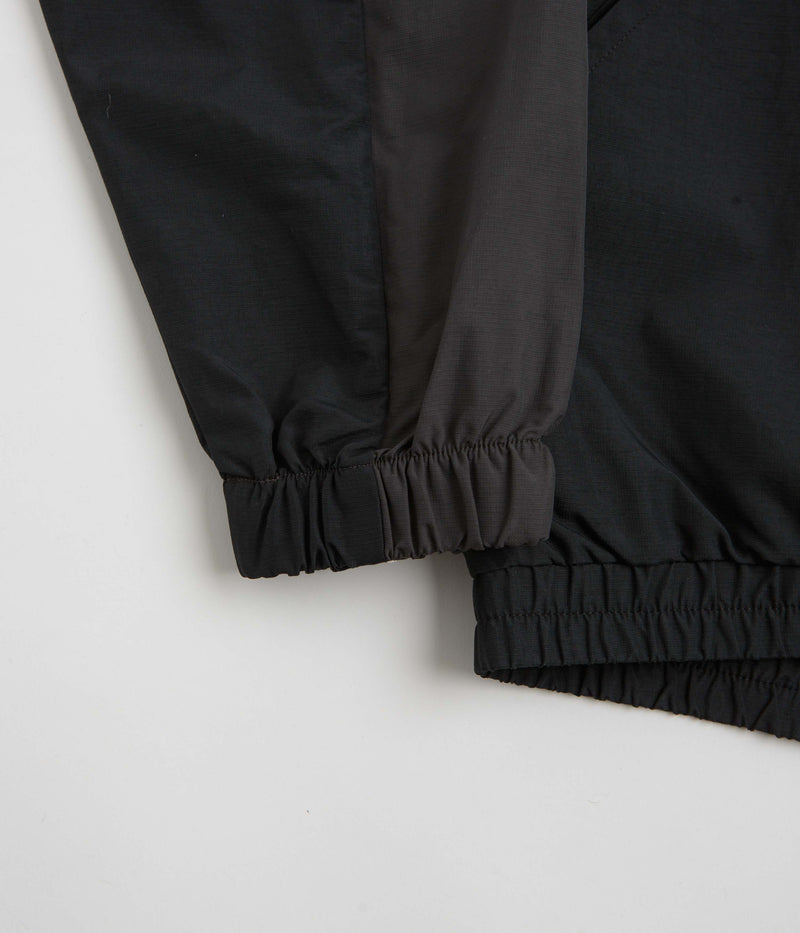 Umbro Rose Crest Masked Track Jacket in Black and Dark Gray